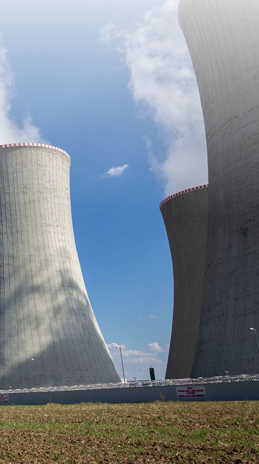 Cooling towers at nuclear power plant, energy self-sufficiency, greenhouse emission reduction