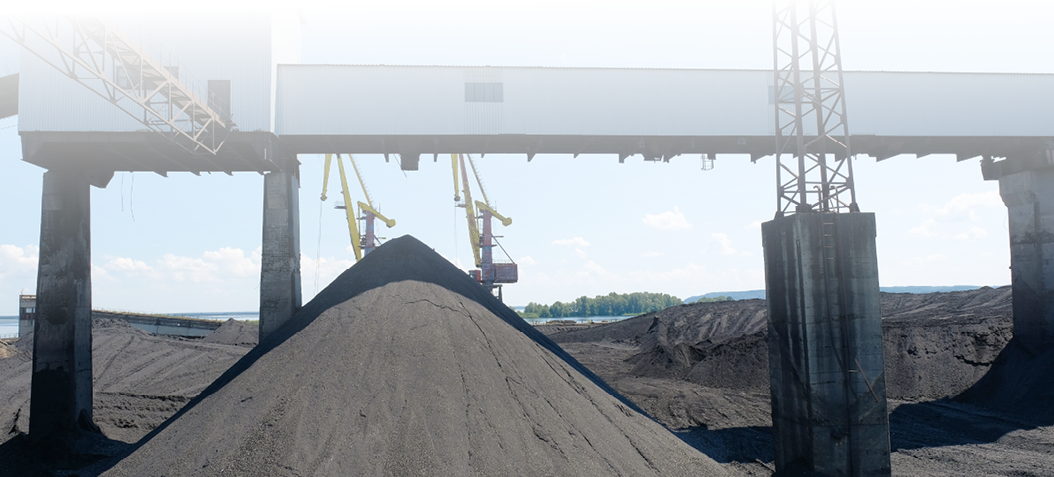 Coal mining and storage. Work in the port coal handling terminal. Stone coal Industry.