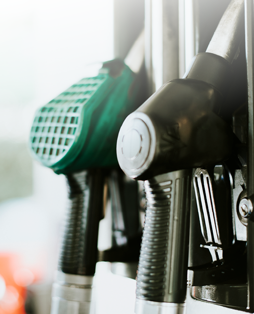 Closeup of fuel nozzles at a gas station
