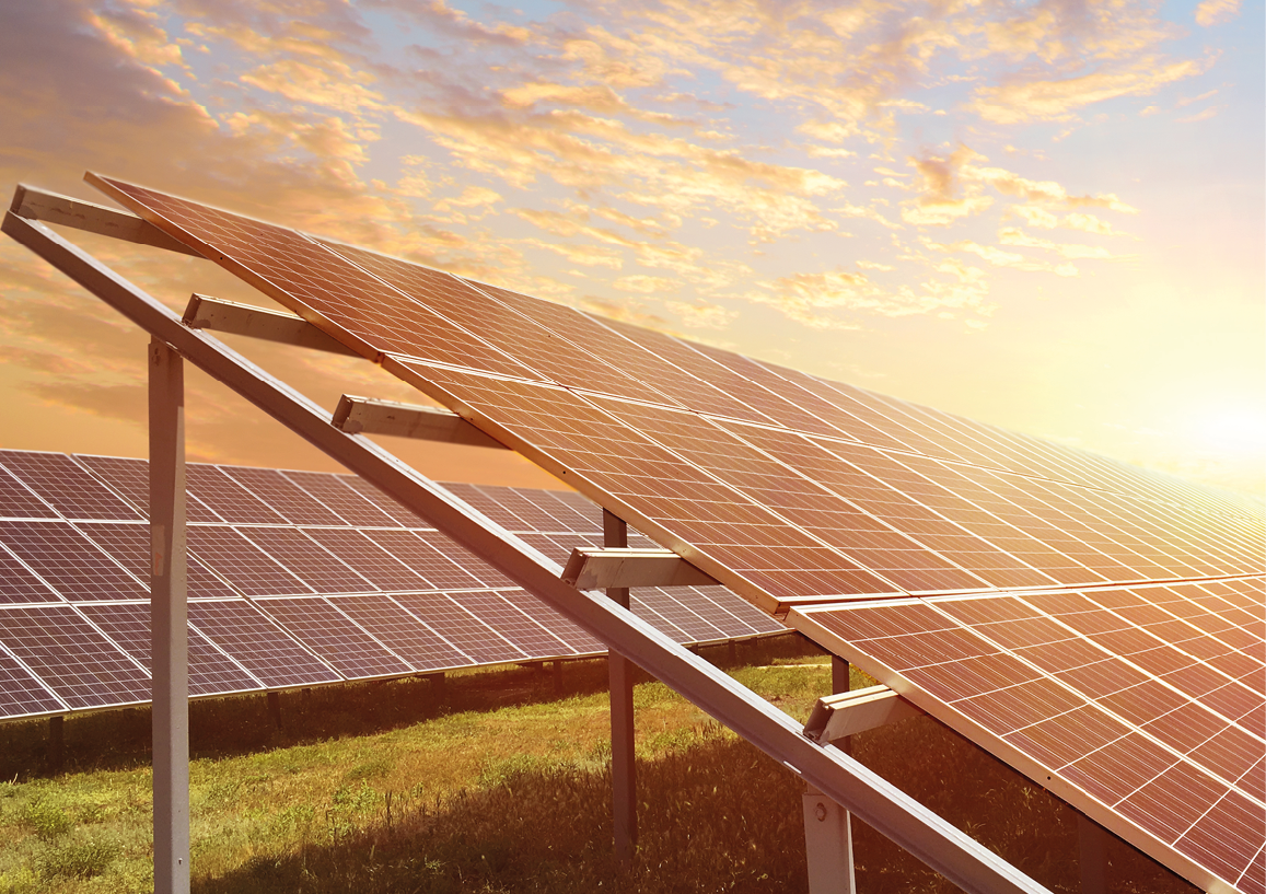  Solar panels in the rays of sunrise. Concept of sustainable resources