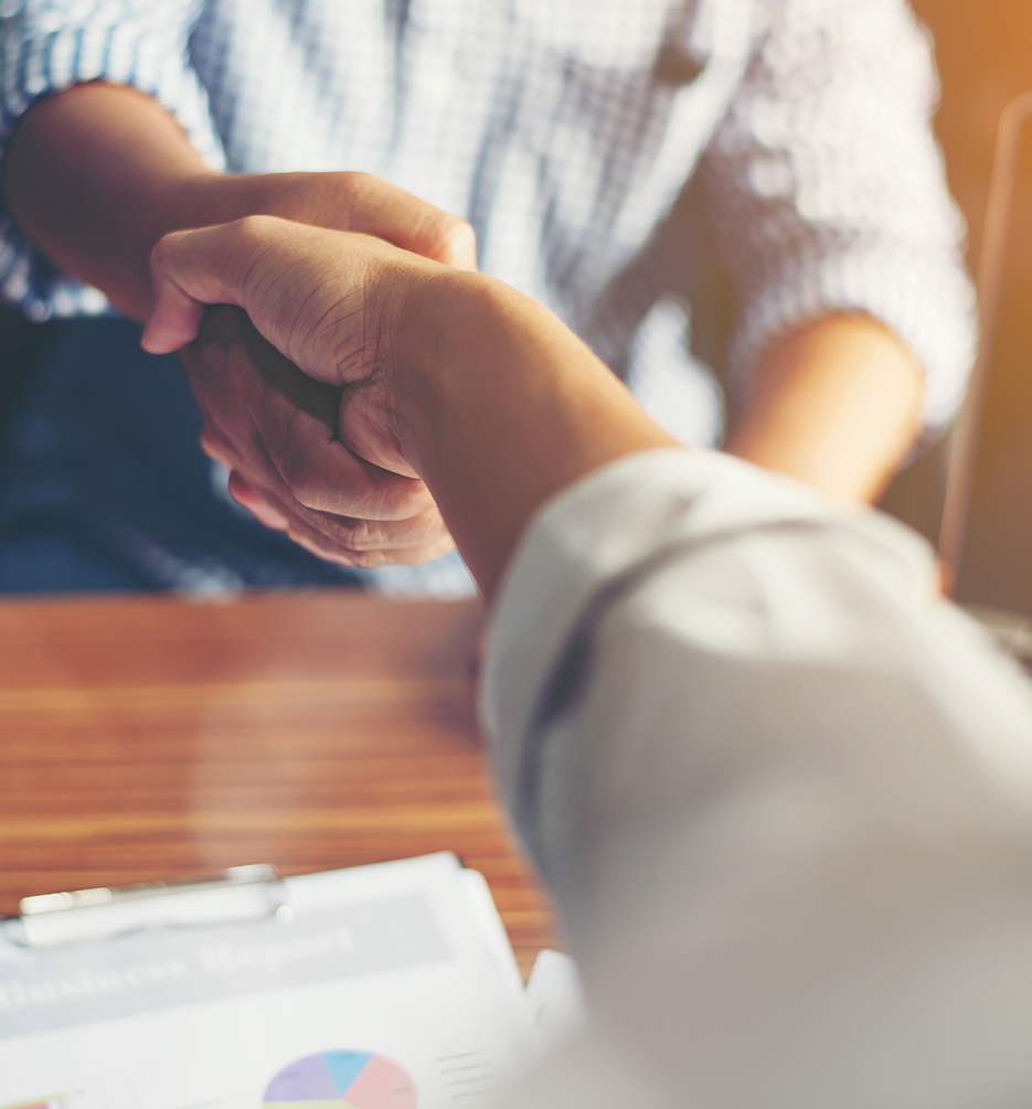 Business People Handshake Greeting Deal at work.