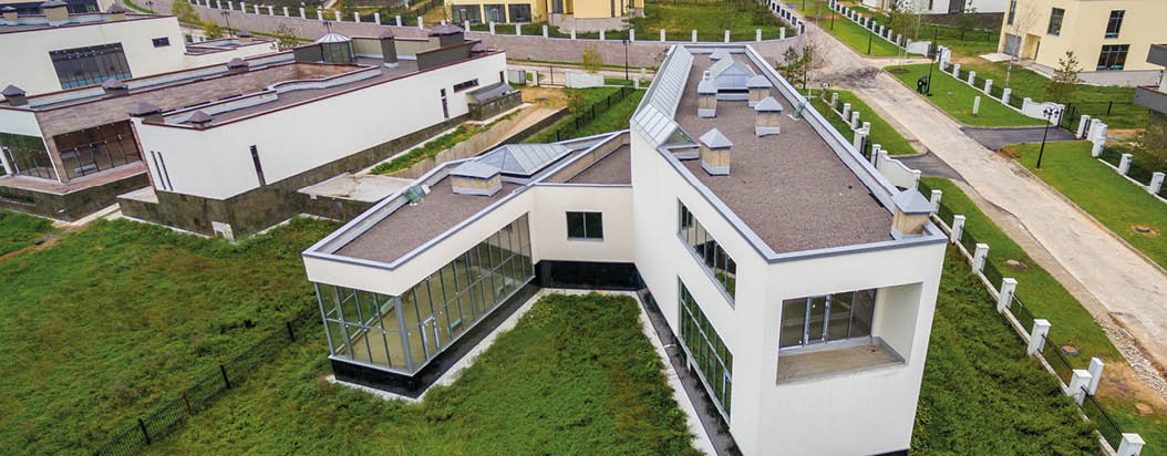 Modern country houses under construction as seen from air