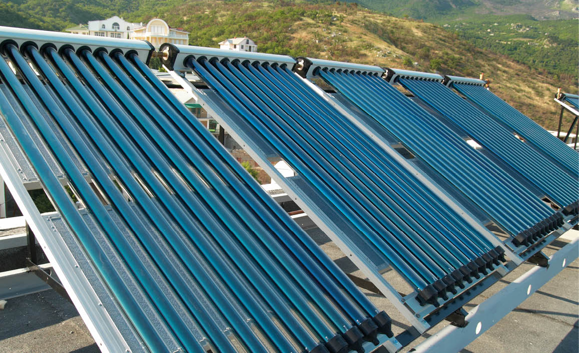 Vacuum solar water heating system on the house roof.